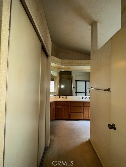 4773 Mount Rainier St, Jurupa Valley, CA 92509 - bathroom with double vanity and vaulted ceiling