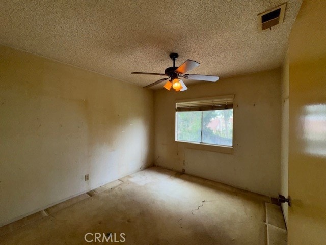 4773 Mount Rainier St, Jurupa Valley, CA 92509 - spare room with a textured ceiling and a ceiling fan