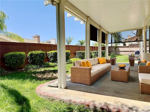 42977 Calle Londe, Temecula, CA 92592 - fenced backyard featuring an outdoor hangout area, grilling area, and a patio