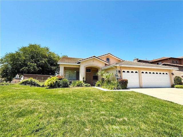 42977 Calle Londe, Temecula, CA 92592 - mediterranean / spanish-style house with stucco siding, an attached garage, a tile roof, a front lawn, and concrete driveway