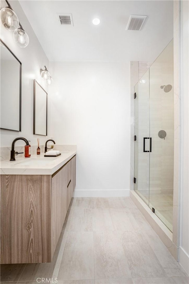 1567 Hi Point St, Los Angeles, CA 90035 - bathroom featuring vanity, a shower stall, and recessed lighting