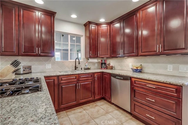 1332 Carew St, San Dimas, CA 91773 - kitchen with dishwasher, reddish brown cabinets, black gas cooktop, tasteful backsplash, and recessed lighting