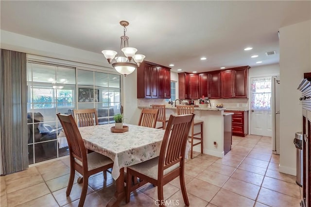 1332 Carew St, San Dimas, CA 91773 - dining room featuring light tile patterned flooring, recessed lighting, and a chandelier
