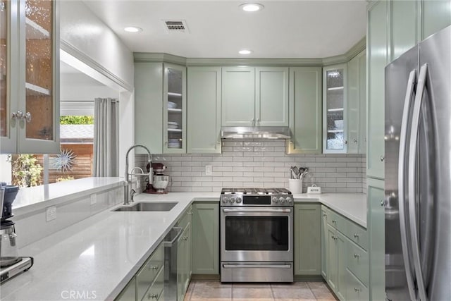 4187 County Road M, Orland, CA 95963 - kitchen with green cabinetry, appliances with stainless steel finishes, under cabinet range hood, and recessed lighting