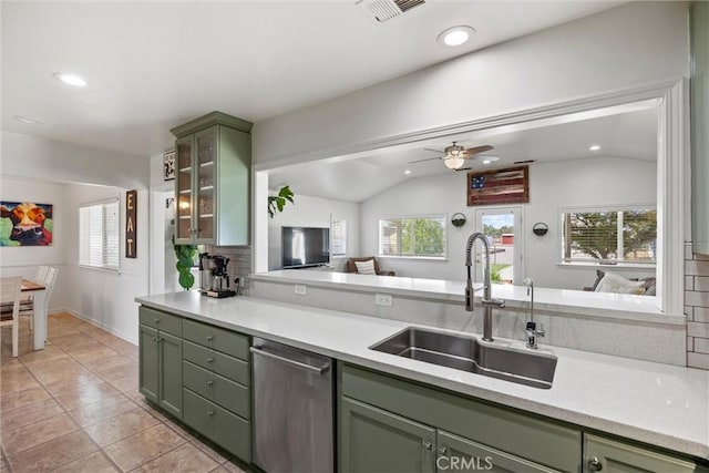 4187 County Road M, Orland, CA 95963 - kitchen with green cabinetry, stainless steel dishwasher, vaulted ceiling, a ceiling fan, and light countertops