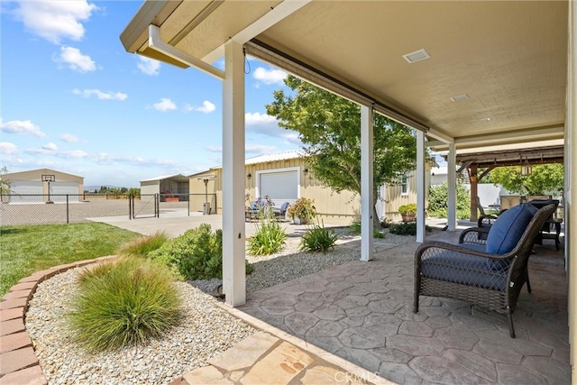 4187 County Road M, Orland, CA 95963 - view of patio featuring a gate and an outdoor structure