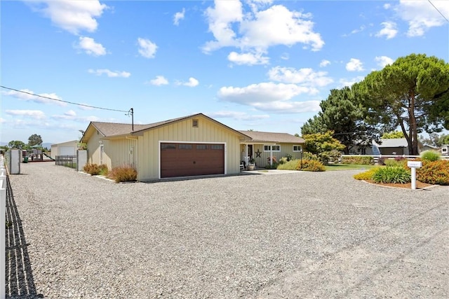 4187 County Road M, Orland, CA 95963 - single story home featuring driveway, a garage, and board and batten siding