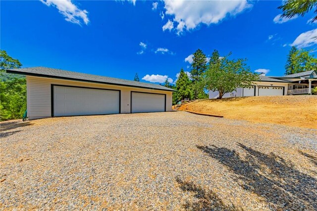 53235 Finegold Creek Ct, North Fork, CA 93643 - view of front of home featuring a detached garage and an outdoor structure