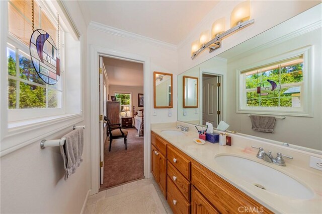 53235 Finegold Creek Ct, North Fork, CA 93643 - ensuite bathroom featuring double vanity, crown molding, and tile patterned floors