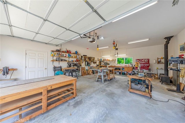 53235 Finegold Creek Ct, North Fork, CA 93643 - garage featuring a workshop area and a garage door opener