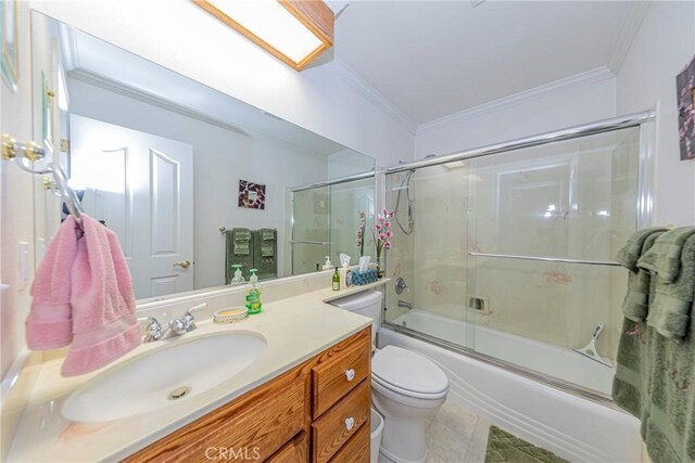 53235 Finegold Creek Ct, North Fork, CA 93643 - full bath with ornamental molding, vanity, bath / shower combo with glass door, and tile patterned floors