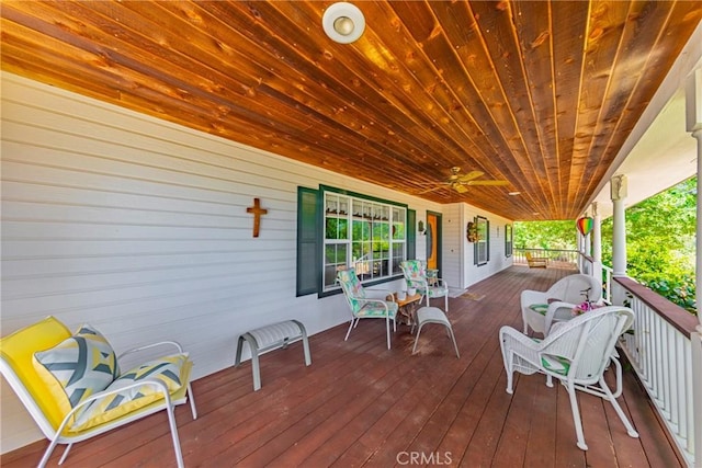 53235 Finegold Creek Ct, North Fork, CA 93643 - wooden porch featuring ceiling fan