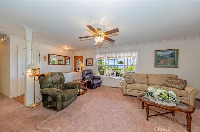 53235 Finegold Creek Ct, North Fork, CA 93643 - carpeted living area with crown molding, a ceiling fan, and decorative columns