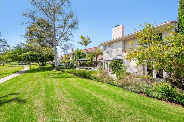 417 Vista Suerte, Newport Beach, CA 92660 - view of grassy yard with a gazebo