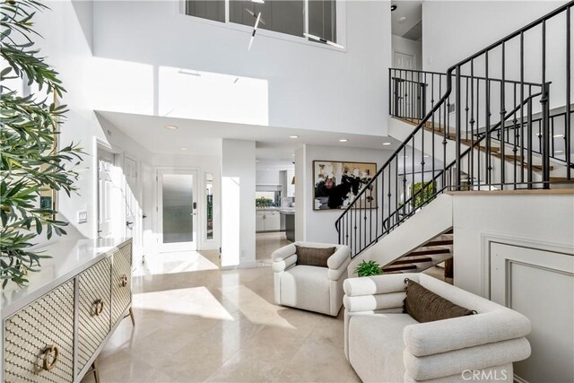 417 Vista Suerte, Newport Beach, CA 92660 - entrance foyer with a high ceiling, stairway, plenty of natural light, and recessed lighting
