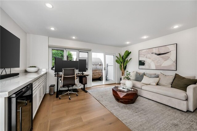 417 Vista Suerte, Newport Beach, CA 92660 - living room featuring beverage cooler, light wood-type flooring, recessed lighting, and an office area