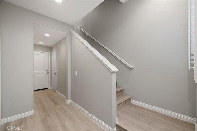 11118 Bunker Ln, Whittier, CA 90604 - stairway featuring wood finished floors and recessed lighting