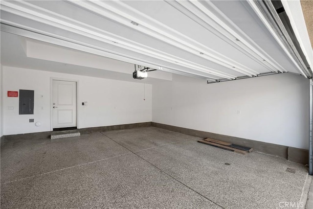 11118 Bunker Ln, Whittier, CA 90604 - garage with electric panel and a garage door opener