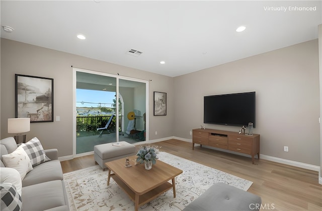 11118 Bunker Ln, Whittier, CA 90604 - living room featuring light wood-type flooring and recessed lighting