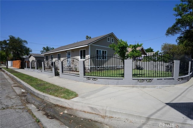 903 E 7th St, Pomona, CA 91766 - ranch-style home with a fenced front yard