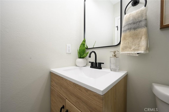 903 E 7th St, Pomona, CA 91766 - bathroom featuring vanity and toilet