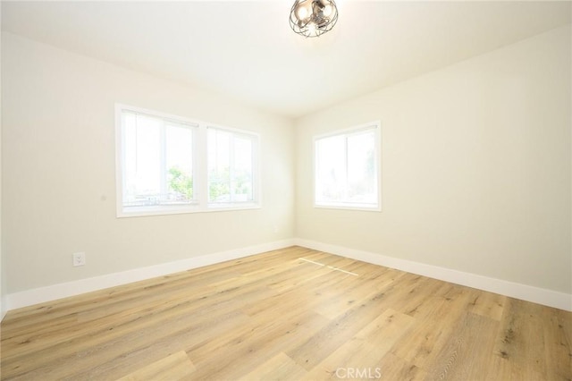 903 E 7th St, Pomona, CA 91766 - spare room with light wood-style flooring