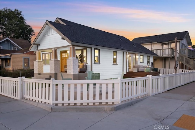 2842 Gunn St, San Diego, CA 92104 - view of front of property featuring a fenced front yard, outdoor lounge area, and roof with shingles