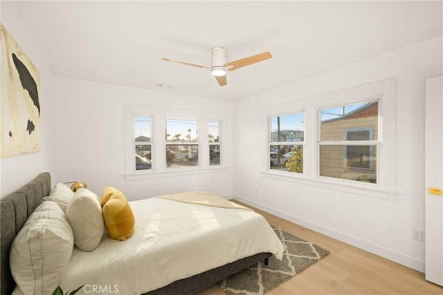 2842 Gunn St, San Diego, CA 92104 - bedroom with light wood-style flooring and ceiling fan
