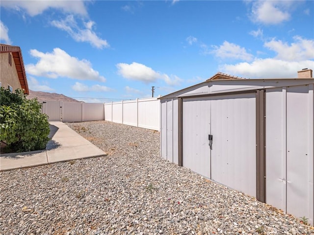 21756 Tussing Ranch Rd, Apple Valley, CA 92308 - fenced backyard with a storage shed