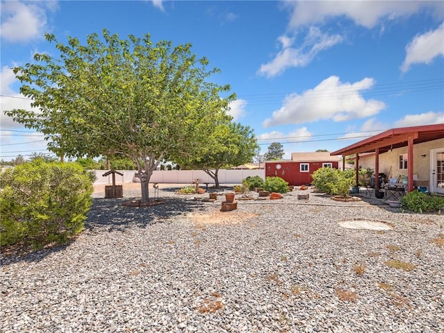 21756 Tussing Ranch Rd, Apple Valley, CA 92308 - view of yard featuring an outbuilding and a patio