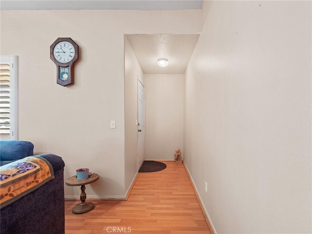 21756 Tussing Ranch Rd, Apple Valley, CA 92308 - hallway featuring light wood-type flooring and baseboards