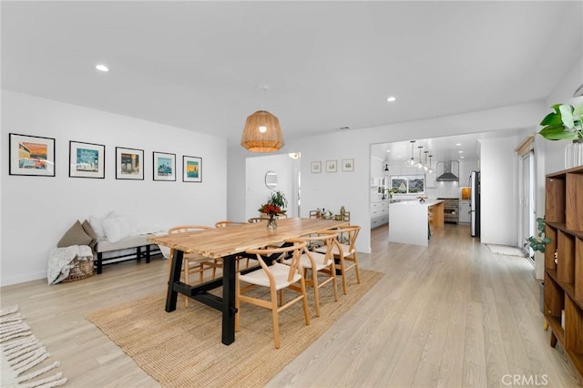 6242 E Pageantry St, Long Beach, CA 90808 - dining space with light wood-style flooring, recessed lighting, and a chandelier