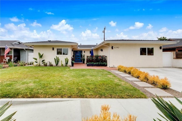 6242 E Pageantry St, Long Beach, CA 90808 - single story home featuring stucco siding and a front lawn