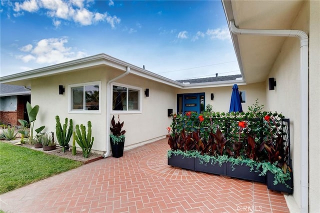 6242 E Pageantry St, Long Beach, CA 90808 - view of front of house featuring stucco siding