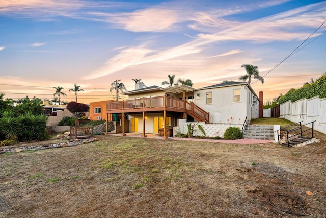 5038 Hastings Rd, San Diego, CA 92116 - rear view of property with a wooden deck, stairs, and stucco siding