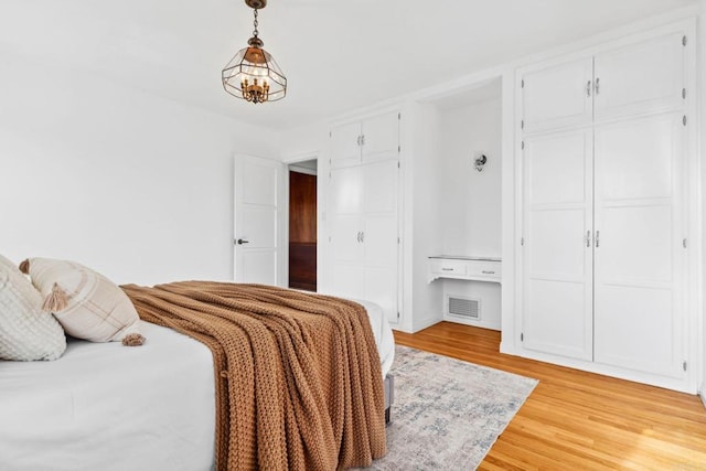 5038 Hastings Rd, San Diego, CA 92116 - bedroom with light wood-style flooring and a closet