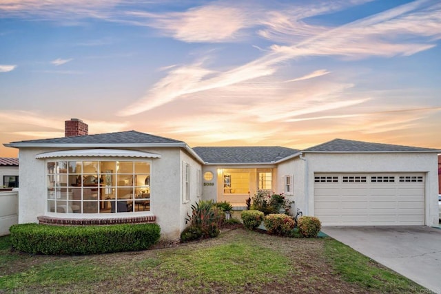 5038 Hastings Rd, San Diego, CA 92116 - ranch-style home with stucco siding, a garage, driveway, and a chimney