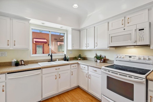 5038 Hastings Rd, San Diego, CA 92116 - kitchen with white appliances, white cabinetry, light countertops, light wood-style floors, and recessed lighting