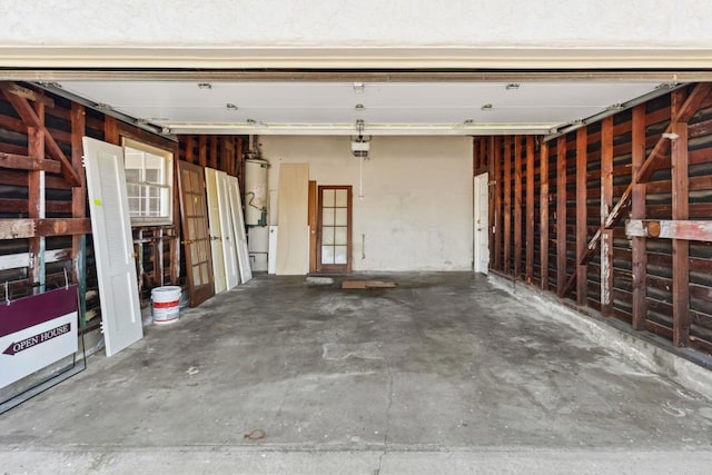 5038 Hastings Rd, San Diego, CA 92116 - garage with water heater and a garage door opener