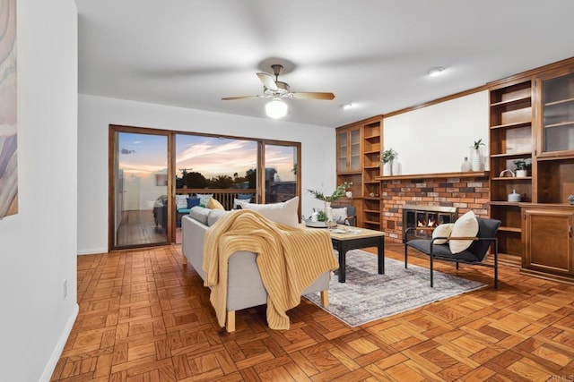 5038 Hastings Rd, San Diego, CA 92116 - living room featuring ceiling fan and a fireplace