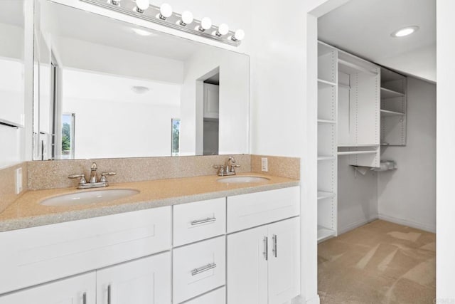 5038 Hastings Rd, San Diego, CA 92116 - full bathroom featuring double vanity and a walk in closet
