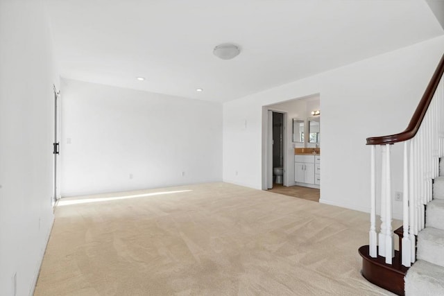 5038 Hastings Rd, San Diego, CA 92116 - spare room with stairway, light carpet, and recessed lighting