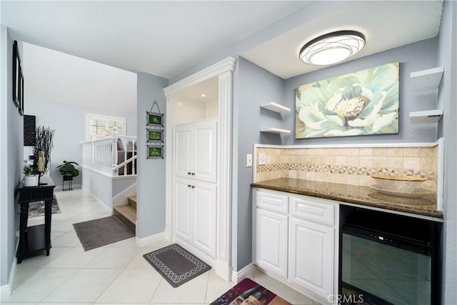 21811 Calatrava, Mission Viejo, CA 92692 - bar area with beverage cooler, backsplash, light tile patterned floors, and stairs