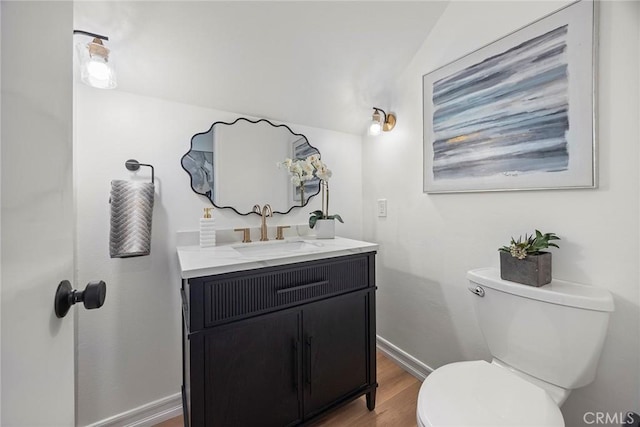 430 Kiolstad Dr, Placentia, CA 92870 - half bathroom with vanity and wood finished floors