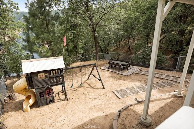 30260 Gremlin Ct, Running Springs, CA 92382 - view of yard featuring a playground and view of scattered trees