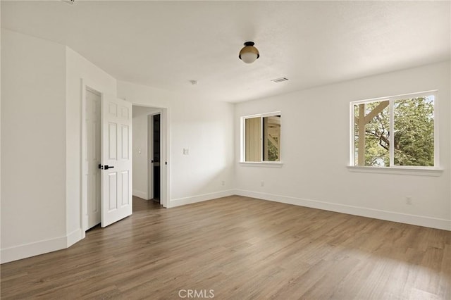 30260 Gremlin Ct, Running Springs, CA 92382 - empty room featuring wood finished floors and baseboards