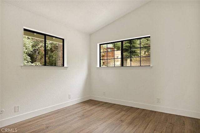 30260 Gremlin Ct, Running Springs, CA 92382 - empty room featuring lofted ceiling and wood finished floors