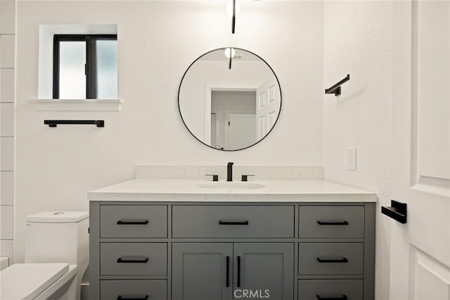 30260 Gremlin Ct, Running Springs, CA 92382 - bathroom featuring vanity and toilet