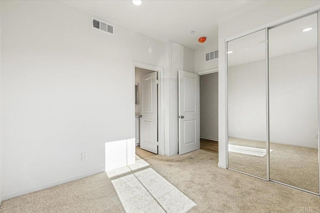 8608 Amherst St, Santee, CA 92071 - unfurnished bedroom featuring carpet floors, a closet, and recessed lighting