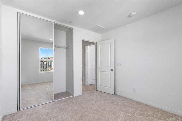 8608 Amherst St, Santee, CA 92071 - unfurnished bedroom featuring carpet flooring, a closet, and recessed lighting